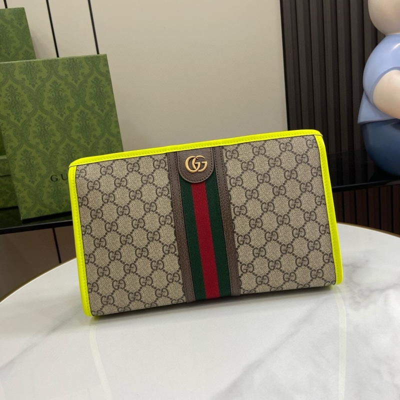 G*u*i clutch bags